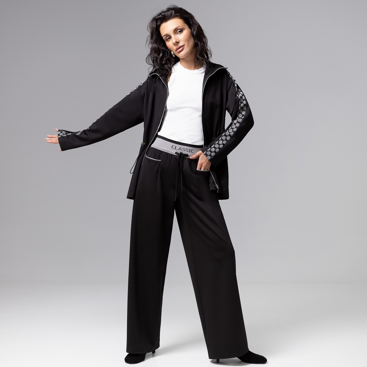 Брюки Красота в движении (чёрные). Состав: 35% п/э, 30% вискоза, 30% нейлон, 5% спандекс